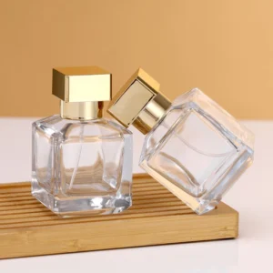 Flacons de parfum en verre transparent avec bouchon doré 70/100ml