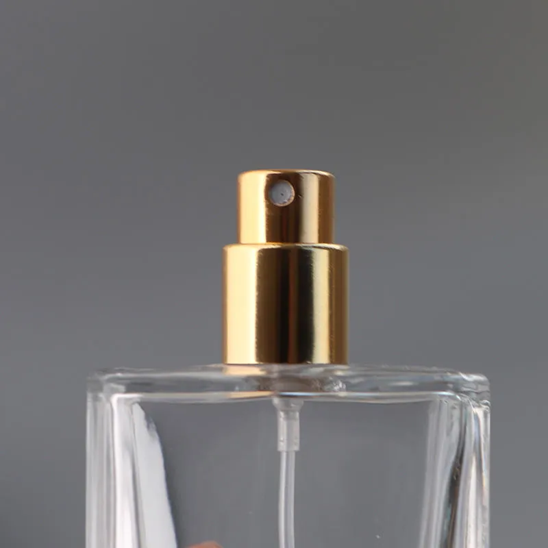 ラグジュアリーな長方形ガラス製トラベルサイズ香水リフィルボトル、スパイラルスプレーノズル付き、50ml