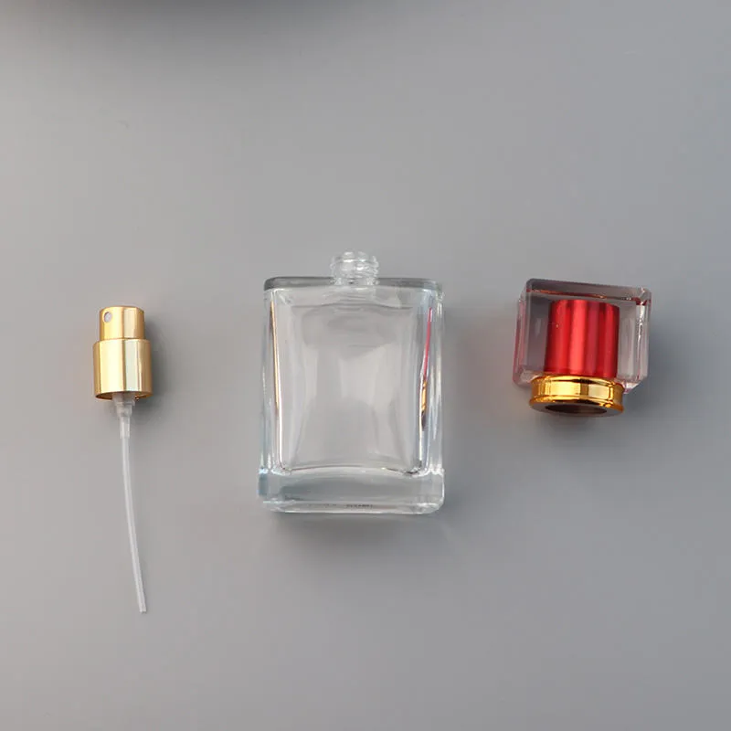 ラグジュアリーな長方形ガラス製トラベルサイズ香水リフィルボトル、スパイラルスプレーノズル付き、50ml