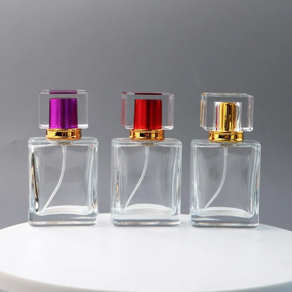 ラグジュアリーな長方形ガラス製トラベルサイズ香水リフィルボトル、スパイラルスプレーノズル付き、50ml
