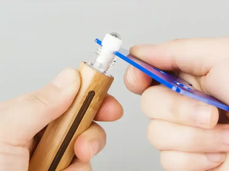 how to remove roller ball from essential oil bottle