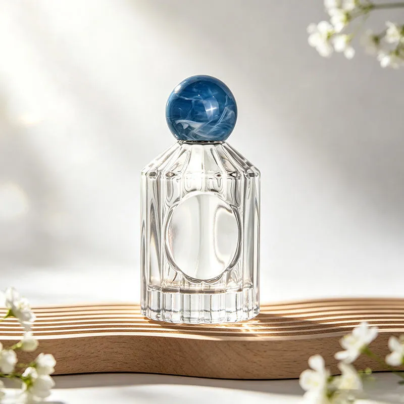 H0b61c38b53294648afff9 50ml 100ml Clear Glass Perfume Bottle Vertical Ribbed Fragrance Sprayer with Marble Ball Cap